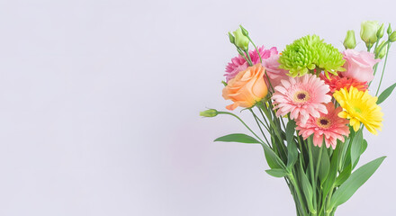 Obraz premium A vibrant bouquet of colorful flowers on a white background