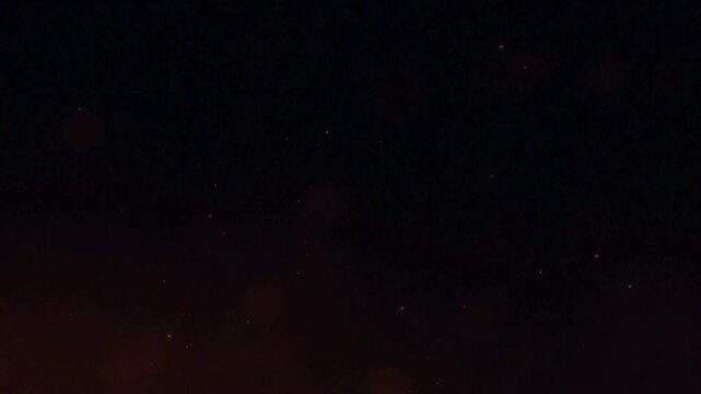 CGI motion graphics of a fierce tiger head made of fire and smoke charging forward with glowing orange embers and intense heat waves against a black background.