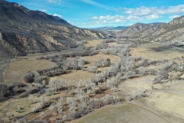 Aerial view of Grass Valley and Grand Hogback ridge near New Castle, Colorado on sunny winter morning.