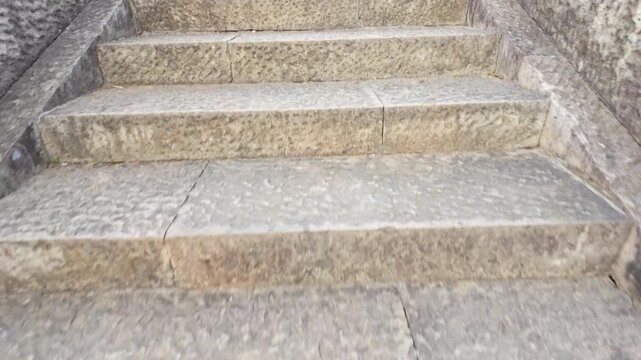 Perspective of climbing stone steps
