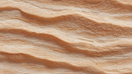 Obraz premium Textured Surface of Fine Sand with Soft Waves and Warm Earthy Tones for Natural and Abstract Backgrounds