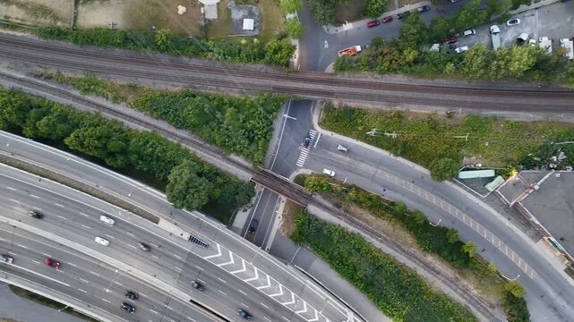 Aerial drone view of Turcot Interchange, Lachine Canal and baseball field at dusk in Montreal, Quebec, Canada. g.