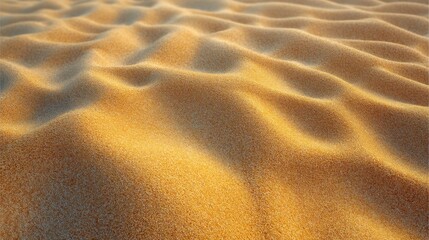 Textured golden sand dunes under soft sunlight creating smooth waves and natural patterns in an outdoor landscape