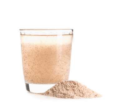 Glass of water with psyllium husk powder on white background