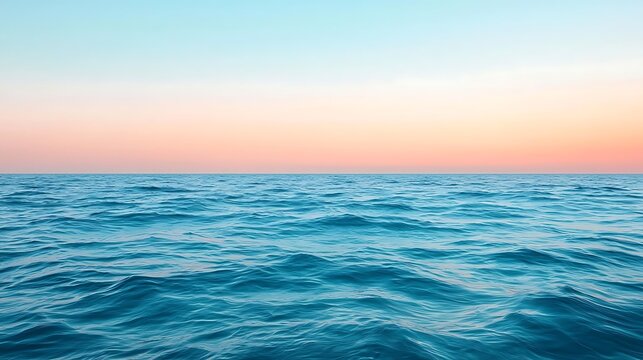 Tranquil Ocean Waves at Sunset with Soft Pastel Sky Colors Above Water Surface