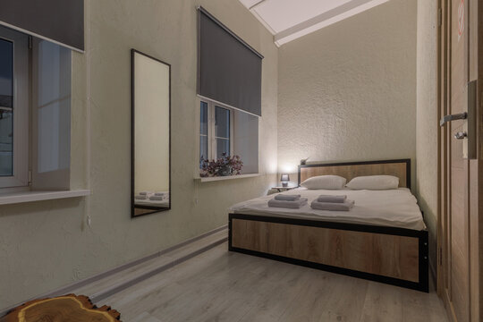 Compact Budget Hotel Room with Double Bed and Modern Amenities