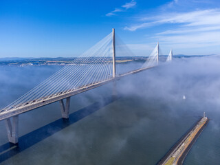 Obraz premium Queensferry Crossing, a prominent road bridge in Scotland. It is known as the longest three-tower, cable-stayed bridge in the world and the tallest bridge in the UK
