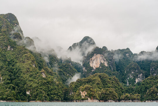 Misty karst mountains at Cheow Lan Lake, Khao Sok National Park