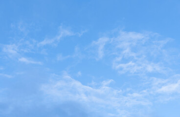 Blue sky background,White fluffy clouds,Soft light gradient atmosphere.Calm natural cloudscape with airy texture,Daylight mood,Horizon Web banner design,Nature background,Weather in Spring,Summer