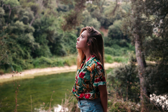 Young woman surrounded by nature