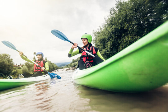 Germany, Bavaria, Allgaeu, couple kayaking on river Iller