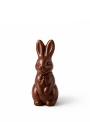 Chocolate Easter bunny with a bow on a clean light background. Minimal festive composition with copy space, perfect for Easter holiday design, greeting cards, advertising and seasonal spring concepts.