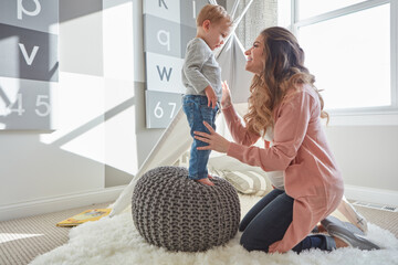 Smile, pregnant woman and child in nursery with mom, play and laugh for bonding together. Love,...