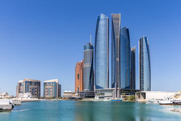 Obraz premium Abu Dhabi skyline with Etihad Towers skyscrapers in Abu Dhabi, United Arab Emirates