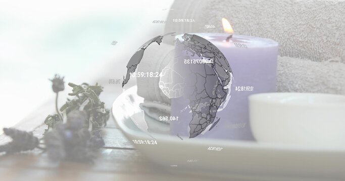 Floating translucent 3D globe graphic showing overlays on wooden tabletop, with lavender and candle