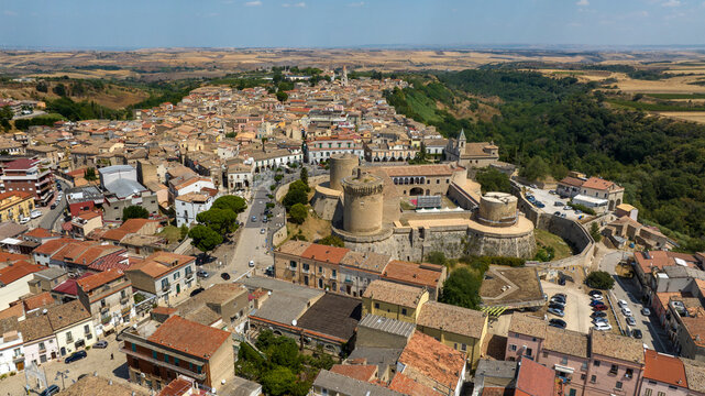 Aerial view of the historic center of Venosa, a small town in province of Potenza, Basilicata, Italy. At the center is the Aragonese Castle, a historic fortified building and attraction of the city.
