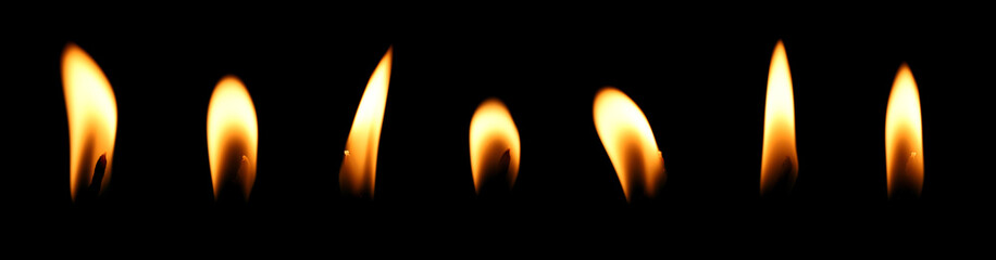 Set realistic burning candle with a glowing orange and gold flame, isolated on a black background, perfect for Christmas, birthdays, Halloween, and holiday celebrations. light effect candle fire flame