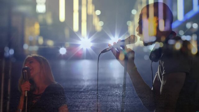 Male singer leaning into mic, cam pulling back revealing music duo singing with starburst asphalt