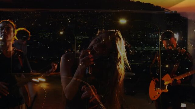 Opening riff sparking vocalist whipping hair belting into mic boosting energy under city overlay