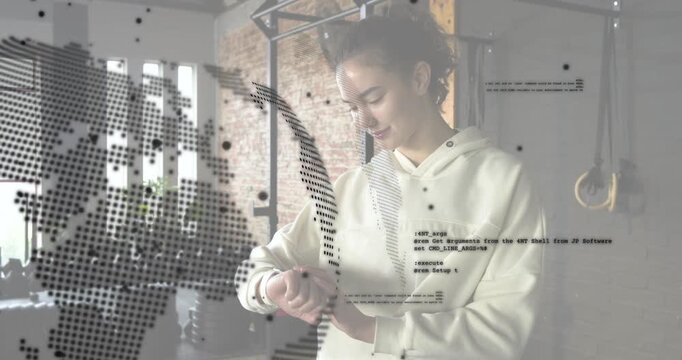 Woman glancing tapping watch checking tech alerts in loft dotted map code blocks drifting on torso