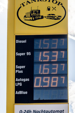 Fuel price board at mountain gas station reflecting rising fuel costs and oil price increase, Austria, Fernpass, 20.3.2025