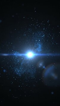 Bright glowing light burst with particles and lens flare effect