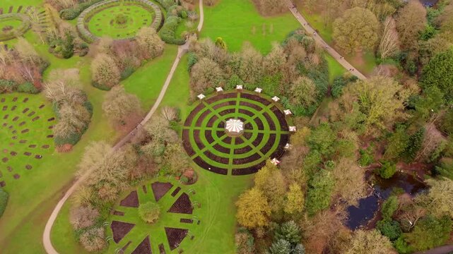 Clockwise 4K 60FPS aerial video of Sir Thomas and Lady Dixon Park in Belfast, Northern Ireland on a sunny day. Produced with Rec709 color.