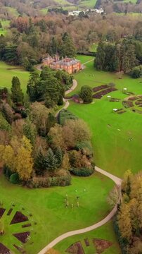Overhead vertical social ratio 60FPS aerial video of Sir Thomas and Lady Dixon Park in Belfast, Northern Ireland on a sunny day. Produced with Rec709 color.