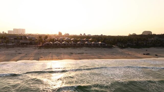 Fly sideways, view of Quan Hai san Tan Tra Beach at sunset, Da Nang