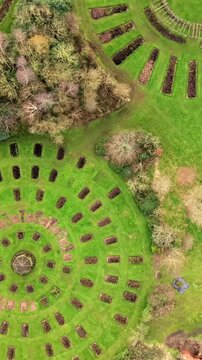 Overhead vertical social ratio 60FPS aerial video of Sir Thomas and Lady Dixon Park in Belfast, Northern Ireland on a sunny day. Produced with Rec709 color.