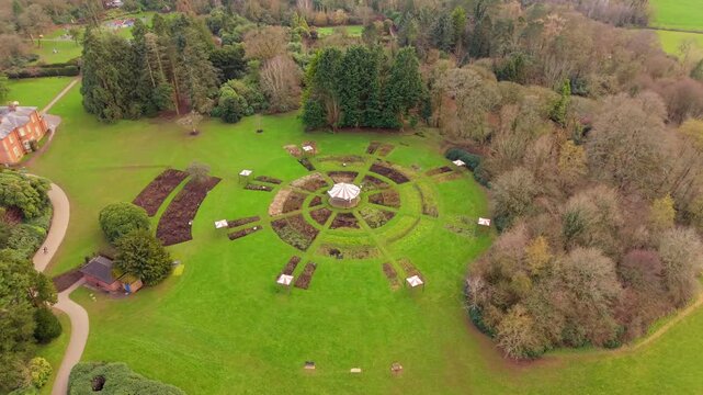 Wide rotating 4K 60FPS aerial video of Sir Thomas and Lady Dixon Park in Belfast, Northern Ireland on a sunny day. Produced with Rec709 color.