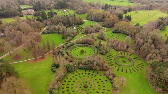 Approaching 4K 60FPS aerial video of Sir Thomas and Lady Dixon Park in Belfast, Northern Ireland on a sunny day. Produced with Rec709 color.