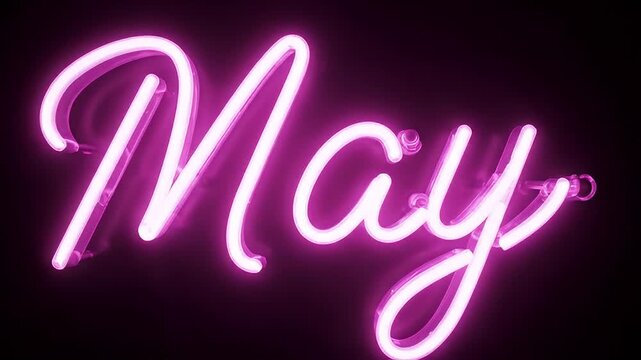 A neon sign with the word May in pink light on a dark background video