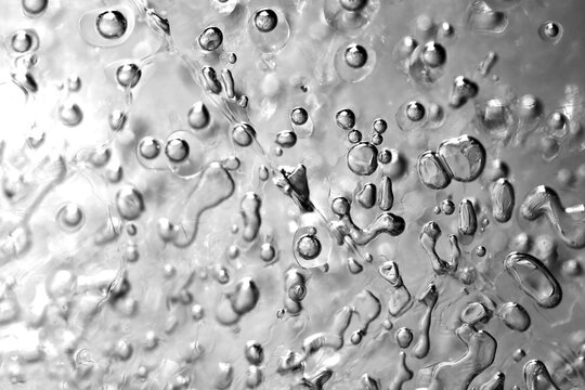 Macro of air bubbles in frozen ice in Germany during winter