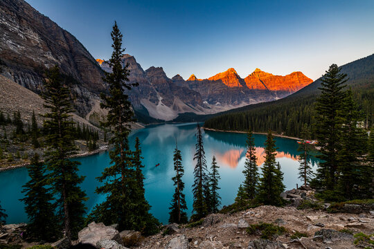 Sunrise at Moraine Lake with mountain and forest in Alberta, Canada