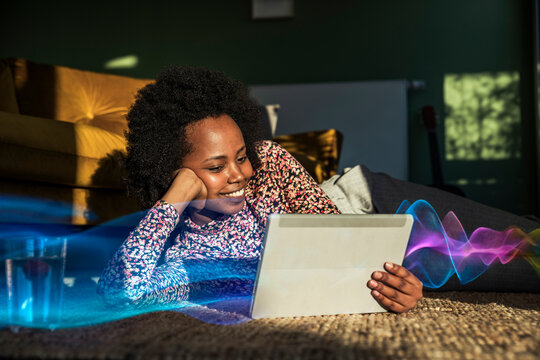 Woman at home relaxing with tablet using chatbot AI technology