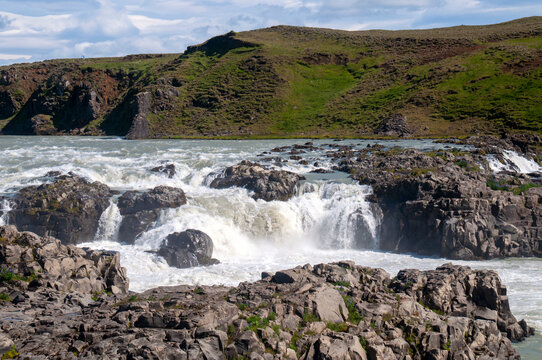 View of Pjorsa river flowing over rock formations