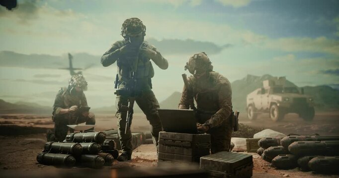 Special Forces Soldiers on Desert Command Post, Using Laptop to Monitor Targets, Reconnaissance, Precision Strike Support Beside Munitions, Helicopters, Tactical Vehicles in Middle East Combat Zone