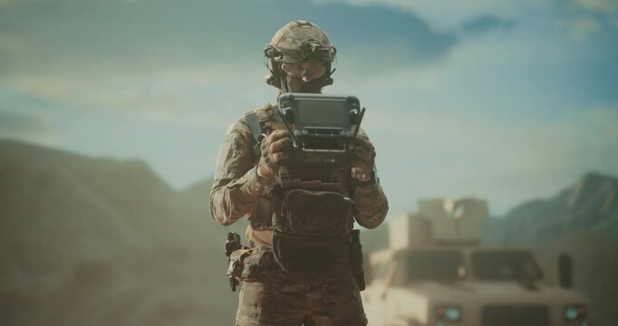 Special Forces Operator Pilots an Quadcopter Drone From a Desert Base, Using Controller for Aerial Surveillance, Targetting, Battlefield Reconnaissance Precision Stike During a Warfare War Mission 