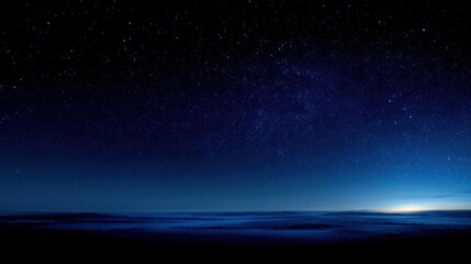 Obraz premium Night sky with stars and illuminated horizon