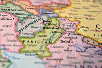 Obraz premium Defocused World Map Background Showing Islamabad Location Top View Geography and Travel Concept