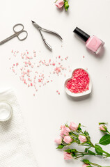 Naklejka premium salt and cream for nail care in spa top view