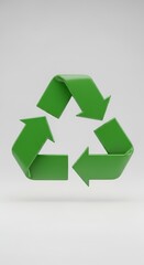 Obraz premium Green recycling symbol on white background.