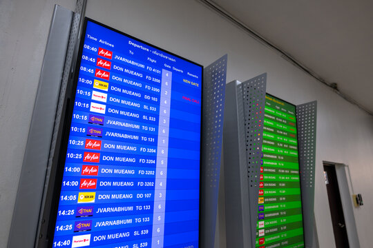 Chiang Rai, Thailand - November 30 2025 : Close up of a digital departure information board inside Chiang Rai International Airport at Chiang Rai, Thailand.
