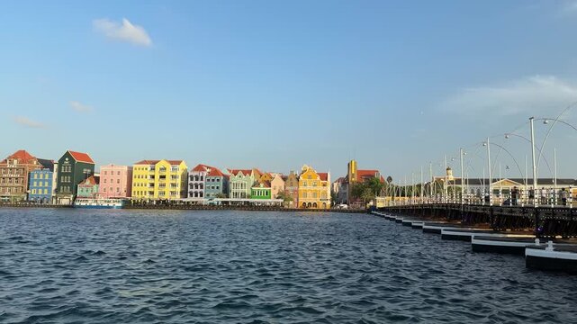Colorful Handelskade Waterfront and Queen Emma Bridge in Willemstad, Curacao