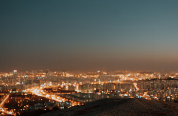 Naklejka premium City night lights, Seoul skyline. High-angle view of the urban city landscape at night with glowing street lights, urban development