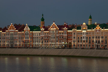Obraz premium Modern colored houses on a summer night on the Bruges embankment, Yoshkar-Ola. Republic of Mari El