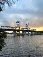 Fototapeta premium View of Ryde Bridge at sunset time, Sydney, Australia.