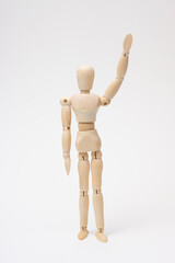 左手を上げるデッサン人形