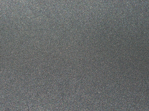 High-resolution anthracite gray metallic surface texture with a smooth matte finish and fine sparkle for architectural 3D rendering.